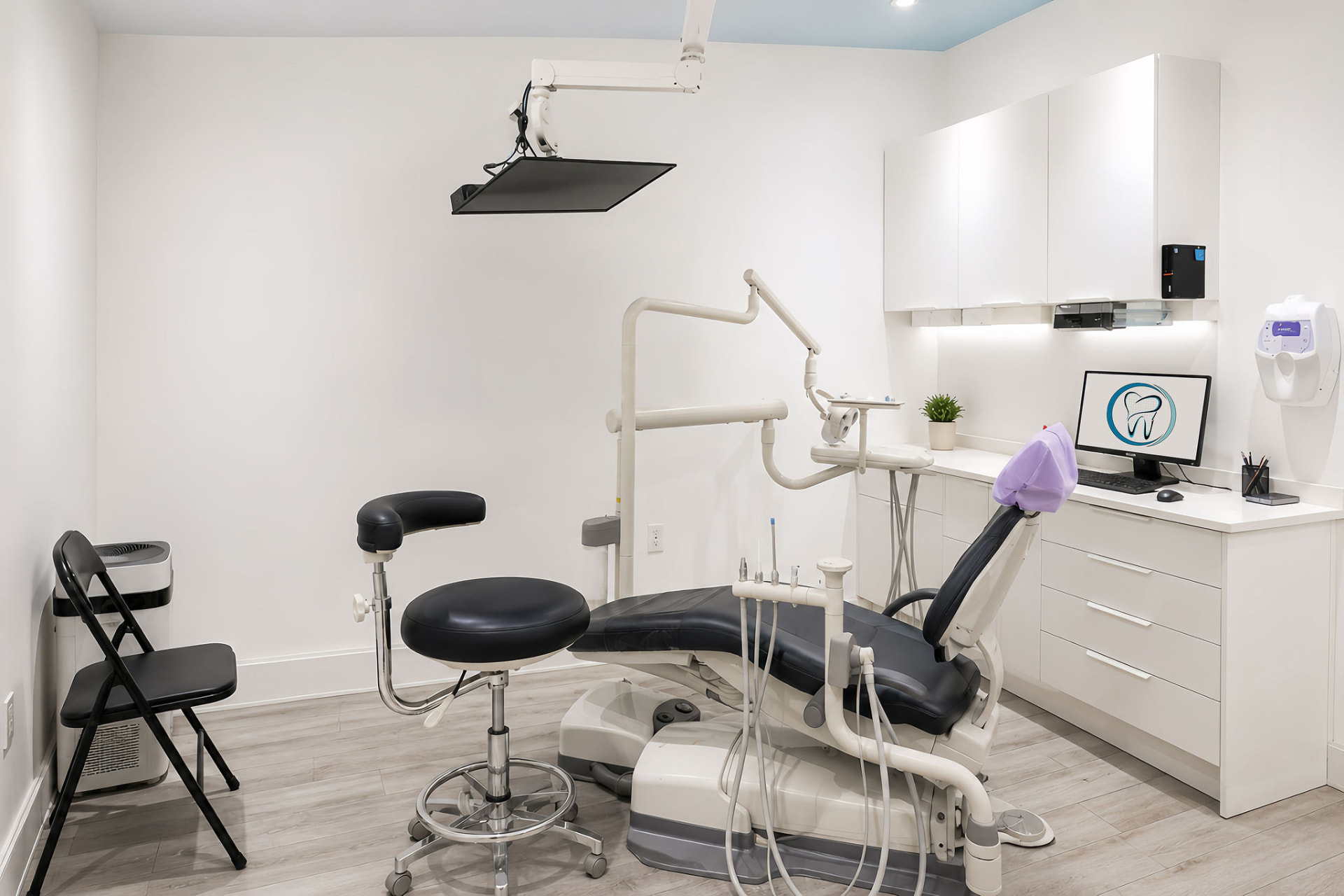 Treatment room with dental chair at Bayly Dental Clinic