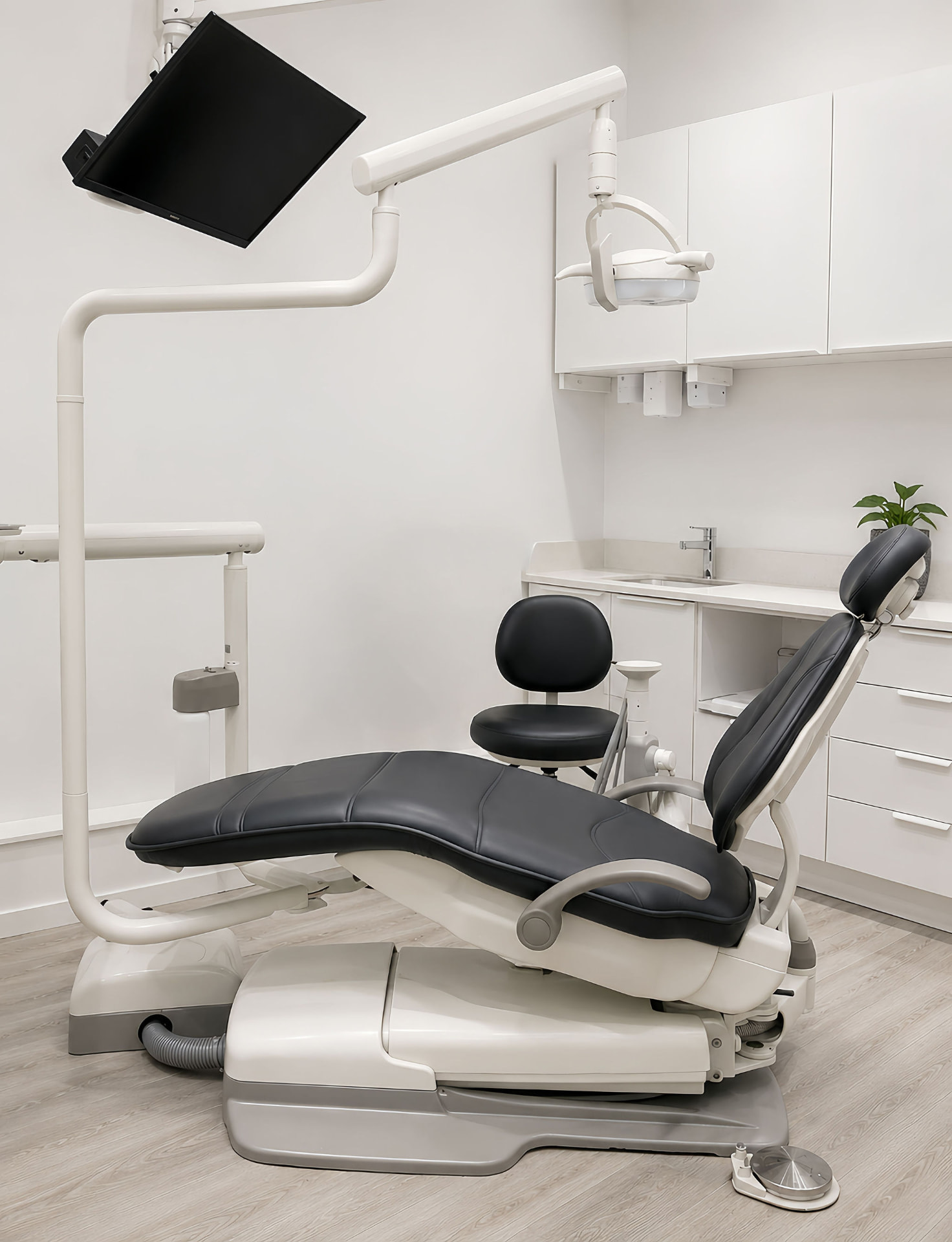 Dental operatory chair and monitor at Bayly Dental Clinic