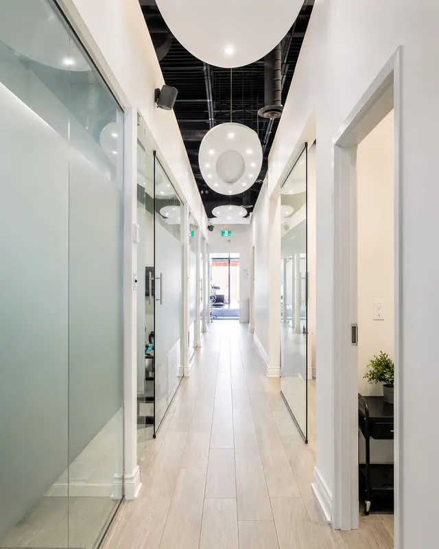 Clinic corridor with feature lighting at Bayly Dental Clinic