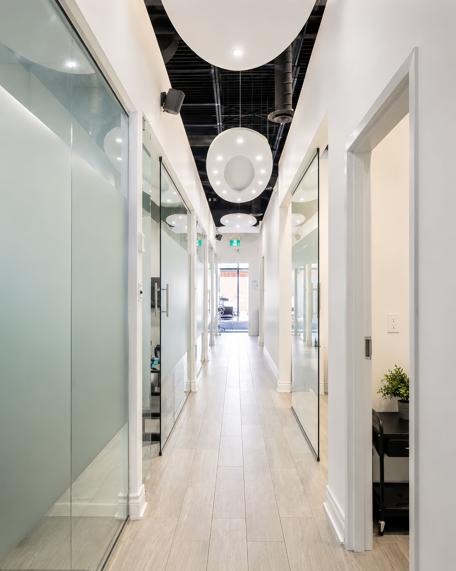 Clinic corridor with feature lighting at Bayly Dental Clinic