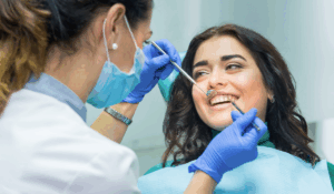 Dentist in Pickering at Bayly Dental Clinic explaining fascinating tooth structure model